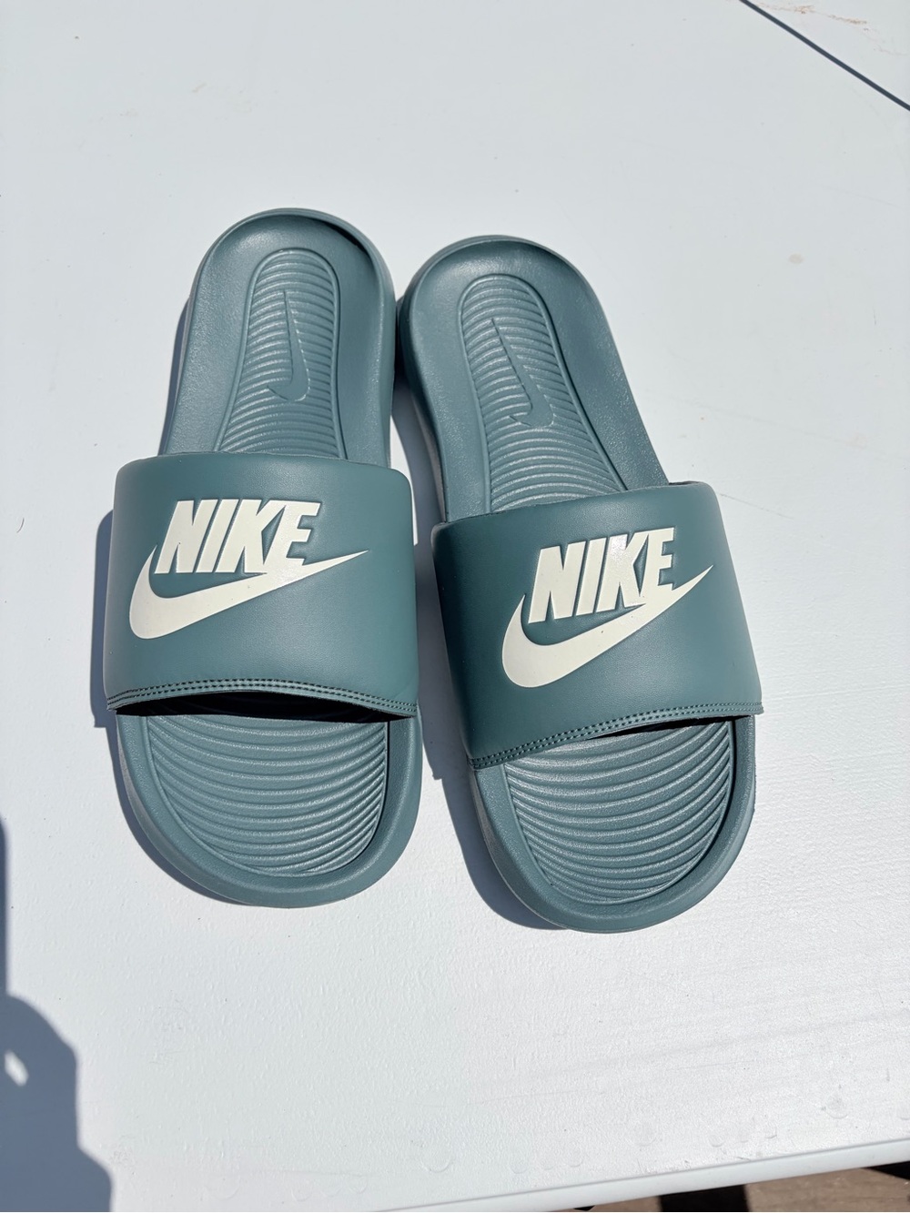 Nike Slide Sandals in Blue-Green with White Logo